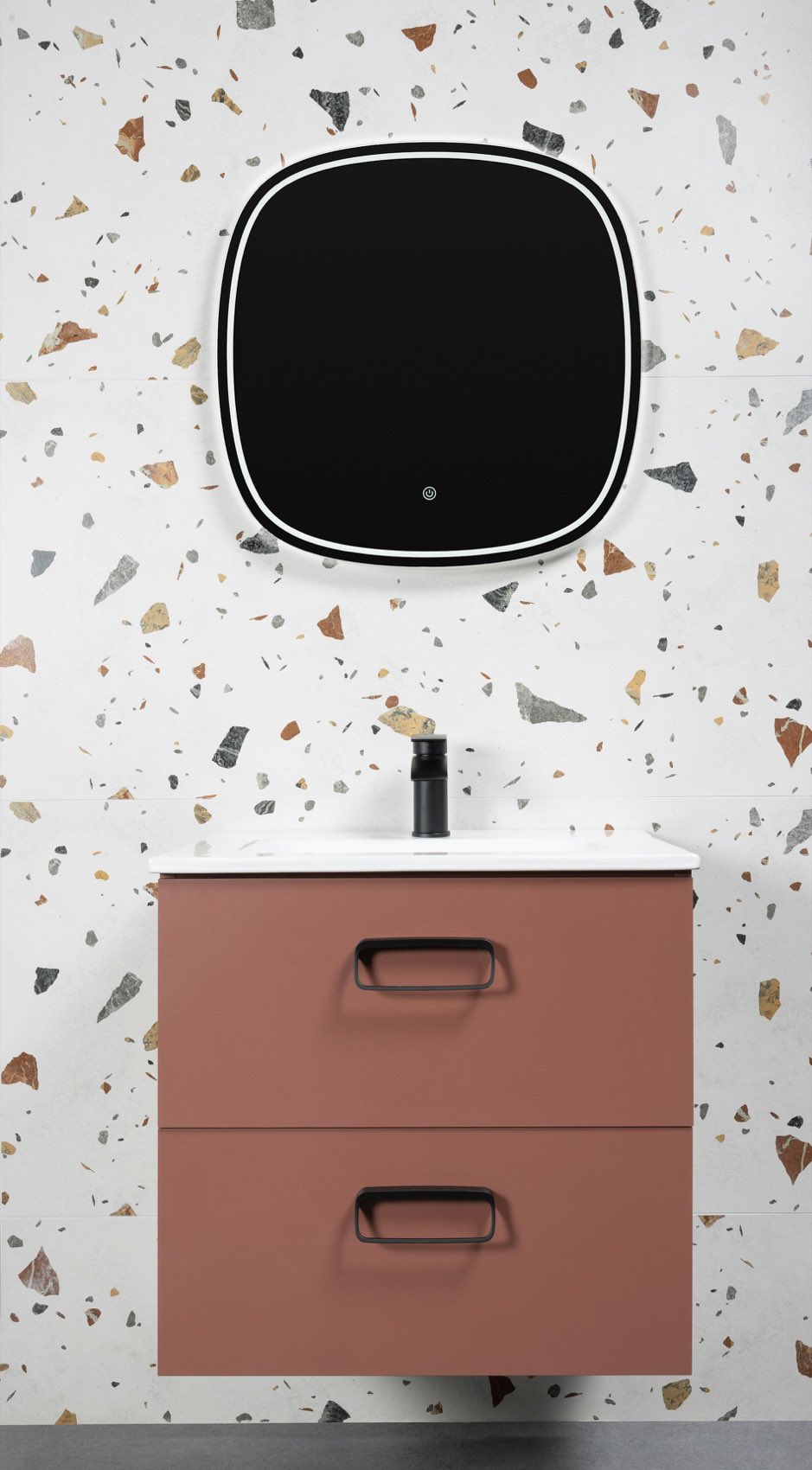 Terrazzo tiles behind a bathroom vanity